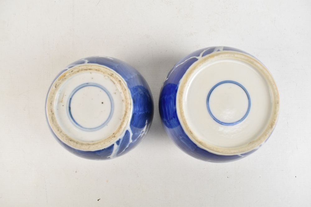 Two similar early 20th century Chinese blue and white prunus decorated jars, height 14cm and 13cm, - Image 6 of 6