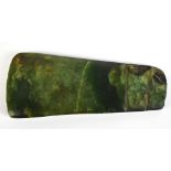 A 19th century Maori green stone tapering axe head with two notched bands to the thinner section,