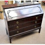 A mahogany bureau, the fall front with moulded detail enclosing fitted interior above three long