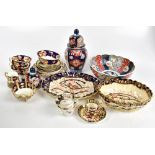 ROYAL CROWN DERBY; a 2451 pattern Imari decorated coffee can and saucer (af), part Royal Albert