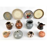 A group of assorted studio and retro ceramics including a bulbous twin handled vase, height 13cm,