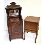 An Edwardian carved mahogany coal purdonium and an early 20th century oak sewing table (2).