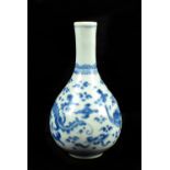 A late 19th/early 20th century Chinese blue and white porcelain baluster vase decorated with a