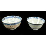 Two Chinese 'rice inset' bowls both with painted four character Kangxi marks to base, diameter 10.