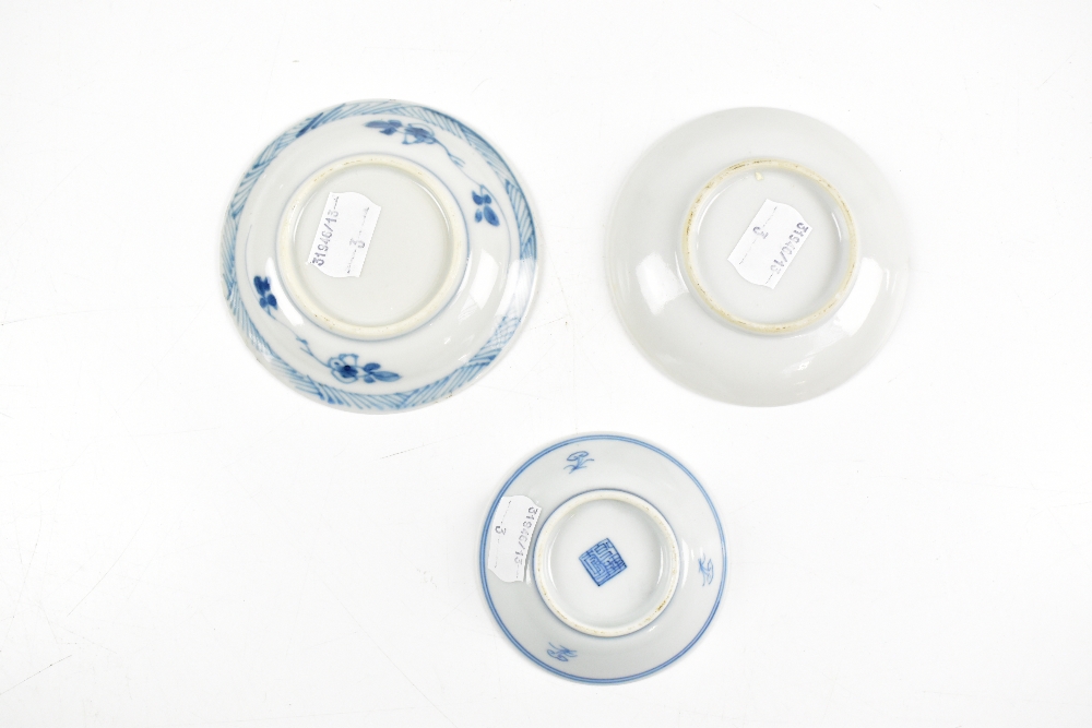 Three Chinese blue and white floral decorated saucer dishes, the larger two unmarked, the smallest - Image 3 of 3