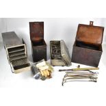 A group of medical equipment, tools and accessories, including a set of trays with stamped mark '