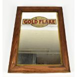 WILLS'S; an original advertising rectangular wall mirror, 'Gold Flake Cigarettes', in an oak