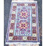 A Middle Eastern rug with stylised detail on blue ground, 139 x 93cm.Additional InformationSurface
