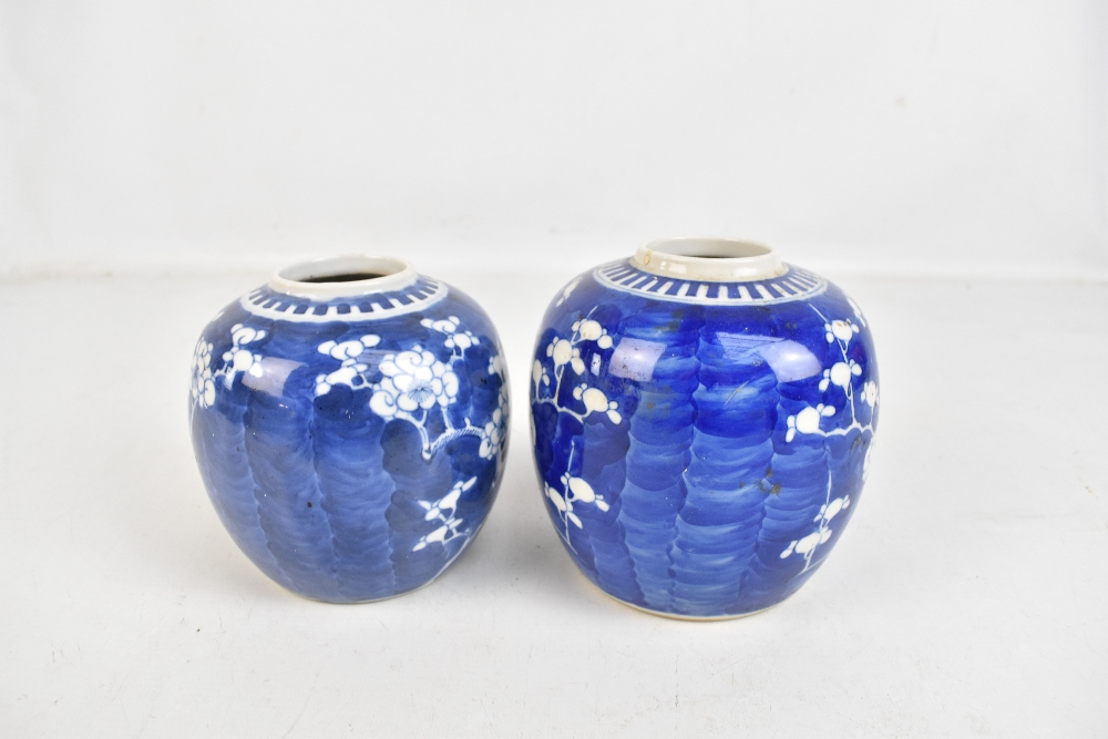 Two similar early 20th century Chinese blue and white prunus decorated jars, height 14cm and 13cm, - Image 4 of 6