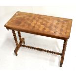 A Victorian walnut and parquetry inlaid centre table.