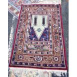 A Middle Eastern rug with stylised detail, approx 165 x 120cm.Additional InformationSome dirt,