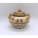 A Japanese Meiji period Satsuma koro of circular form with pierced cover above twin moulded gilt