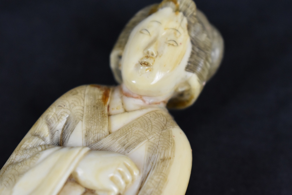 Two Japanese Meiji period carved ivory okimonos, the larger a group featuring man, child and monkey, - Image 5 of 5