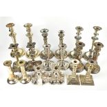Nine pairs of silver plated candlesticks to include Barker Ellis examples with cast decoration,