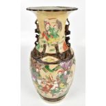 An early 20th century Chinese crackle glazed Famille Rose vase painted with stylised figures,