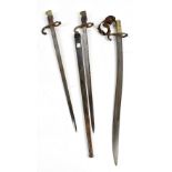 Three late 19th century French bayonets comprising unmarked Chassepot example, length 70cm, and
