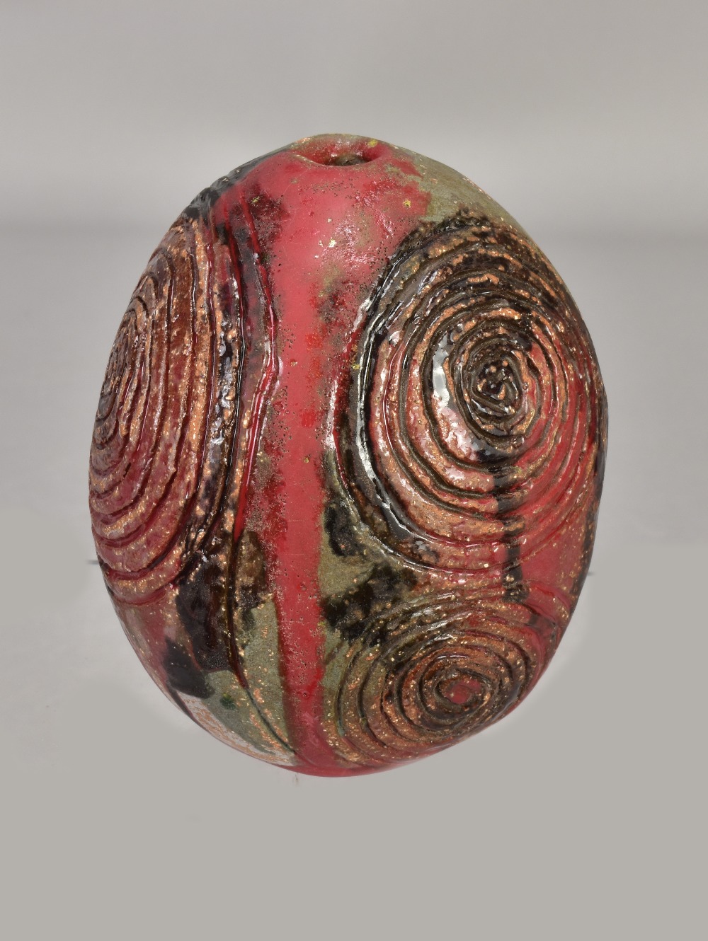 ALAN WALLWORK (1931-2019); a stoneware pod form with incised spiral decoration, incised AW mark,