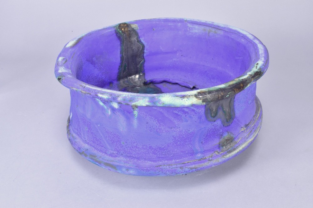 ASHLEY HOWARD (born 1963); a large stoneware bowl covered barium blue and purple glaze, impressed AH