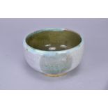 ANDREW MARSHALL (born 1952); a stoneware bowl, copper green and iron glaze decoration on mottled