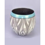 ASHRAF HANNA (born 1967); a bulbous naked raku vessel with linear pattern and turquoise rim, incised