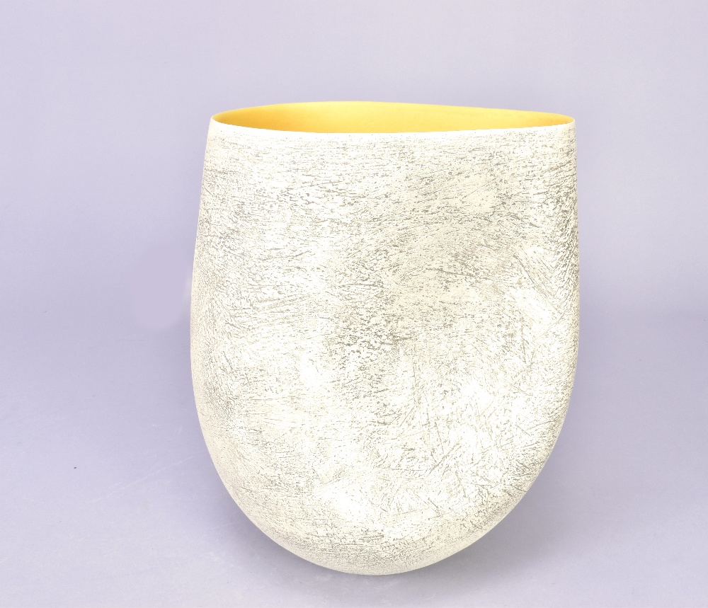 ASHRAF HANNA (born 1967); a textured vessel with yellow interior, incised ASH mark, made 2011,