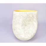 ASHRAF HANNA (born 1967); a textured vessel with yellow interior, incised ASH mark, made 2011,