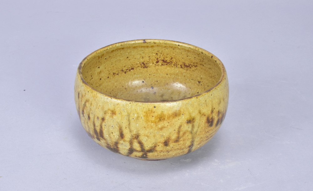 ANDREW MARSHALL (born 1952); a stoneware bowl covered in ash and iron glaze, impressed AM mark,