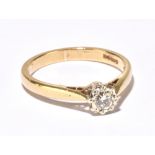 A 9ct yellow gold diamond solitaire ring with illusion setting, size M, approx 2.3g.Additional