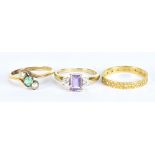 Three 9ct yellow gold dress rings with pink and cubic zirconia example, size N1/2, a full eternity