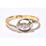 An 18ct yellow gold and tiny three stone diamond ring in swept setting, size M, approx 2.2g.