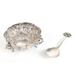 PAIRPOINT BROTHERS; an Arts & Crafts George V hallmarked silver preserve spoon with cast foliate