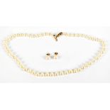 MIKIMOTO; a pearl necklace with 9ct yellow gold clasp, length approx 46cm and a matching pair of ear