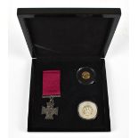 A WWI Victoria Cross commemorative set comprising a half sovereign dated 1914, a silver crown and