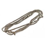 A late Victorian base metal curb link housekeeper's chain, approx length 144cm.Additional