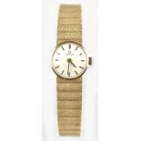 OMEGA; a lady's 9ct yellow gold mechanical cocktail watch, the dial set with baton numerals,