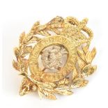 An 18ct yellow gold sweetheart brooch with laurel wreath beneath a crown, 4.5cm, approx 16.7g.