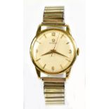 OMEGA; a gentleman's gold plated manual wind wristwatch, with Arabic quarter numerals and batons,