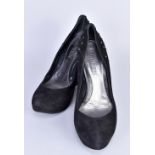 ALEXANDER MCQUEEN; a pair of black suede high wedge shoes decorated with black sequins, size 40.