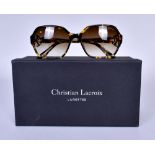 CHRISTIAN LACROIX; a pair of ladies’ tortoiseshell sunglasses in original case and box.Additional