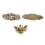 Two hallmarked silver brooches, one example inscribed 'Elsie', and an 800 grade lady's hair clip