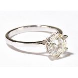 A good platinum and diamond solitaire ring, the round brilliant stone weighing approx 2ct in a six