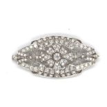 A French Art Deco white metal and diamond set plaque brooch of rounded lozenge form, the central old