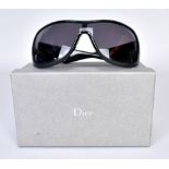 DIOR; a pair of black wraparound goggle sunglasses (with original box).