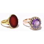 A 14ct yellow gold signet ring set with vacant oval cut carnelian, stamped 585 to band interior,