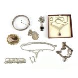 A small quantity of costume jewellery including a well figured brown agate Victorian brooch in