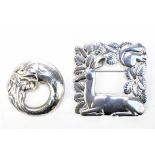 ARNO MALINOWSKI FOR GEORG JENSEN; a sterling silver deer and squirrel brooch no. 318, 4 x 4cm, and a