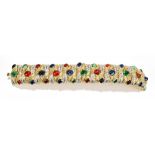 CINER; a gold tone flexible hinged 'Jewels of India' bracelet with multicoloured stones, length