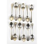 JOHN ROUND; a set of twelve late Victorian hallmarked silver teaspoons engraved with initials to the