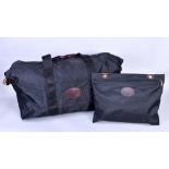 MULBERRY; a small black clipper holdall bag with brown leather trim, 56 x 36 x 19cm.Additional