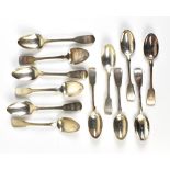 Twelve variously hallmarked silver Fiddle pattern teaspoons with engraved initials to the terminals,